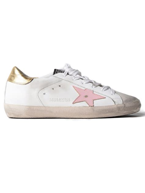 golden goose with pink star.